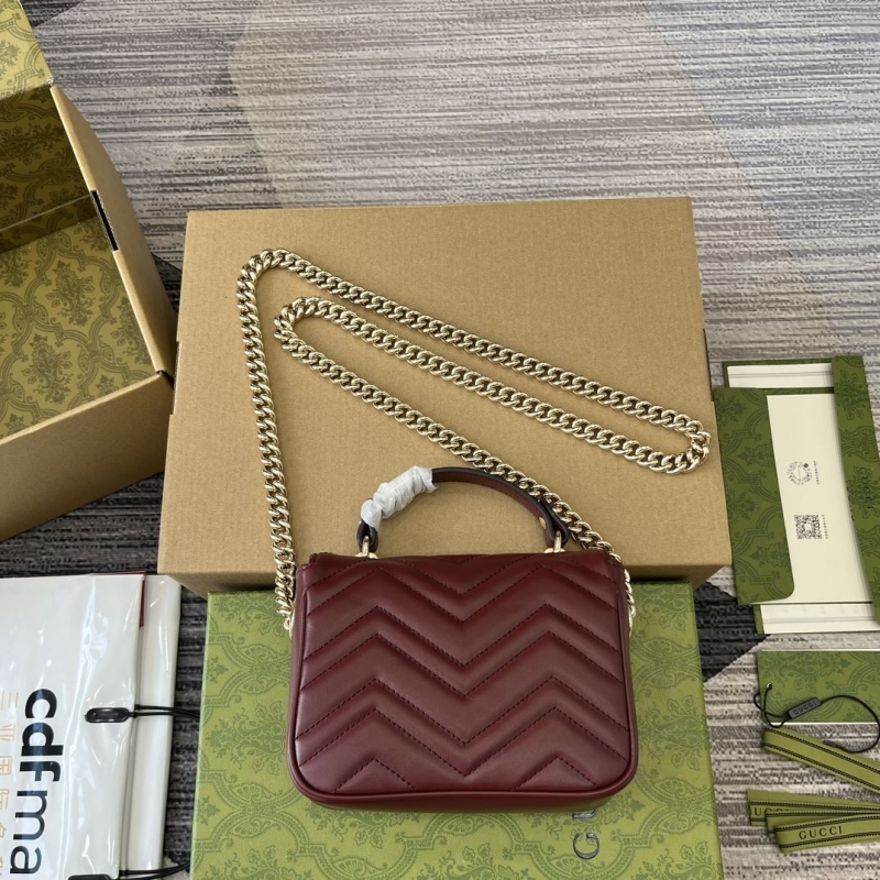G*u*i top handle bags